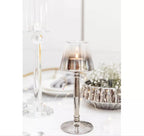 Candelabro de metal e vidro