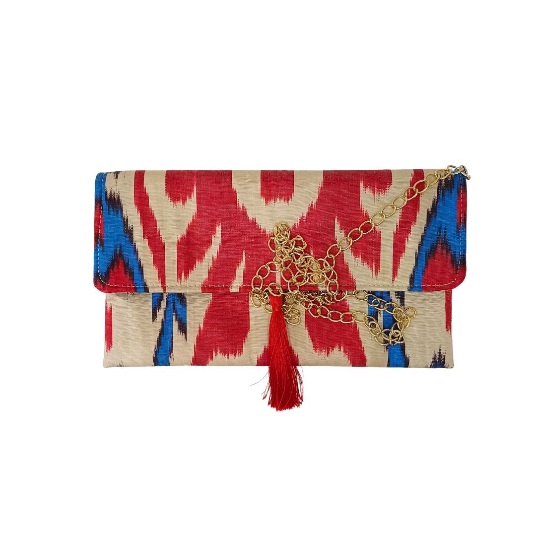 Clutch artesanal Ikat Encarnado e turquesa