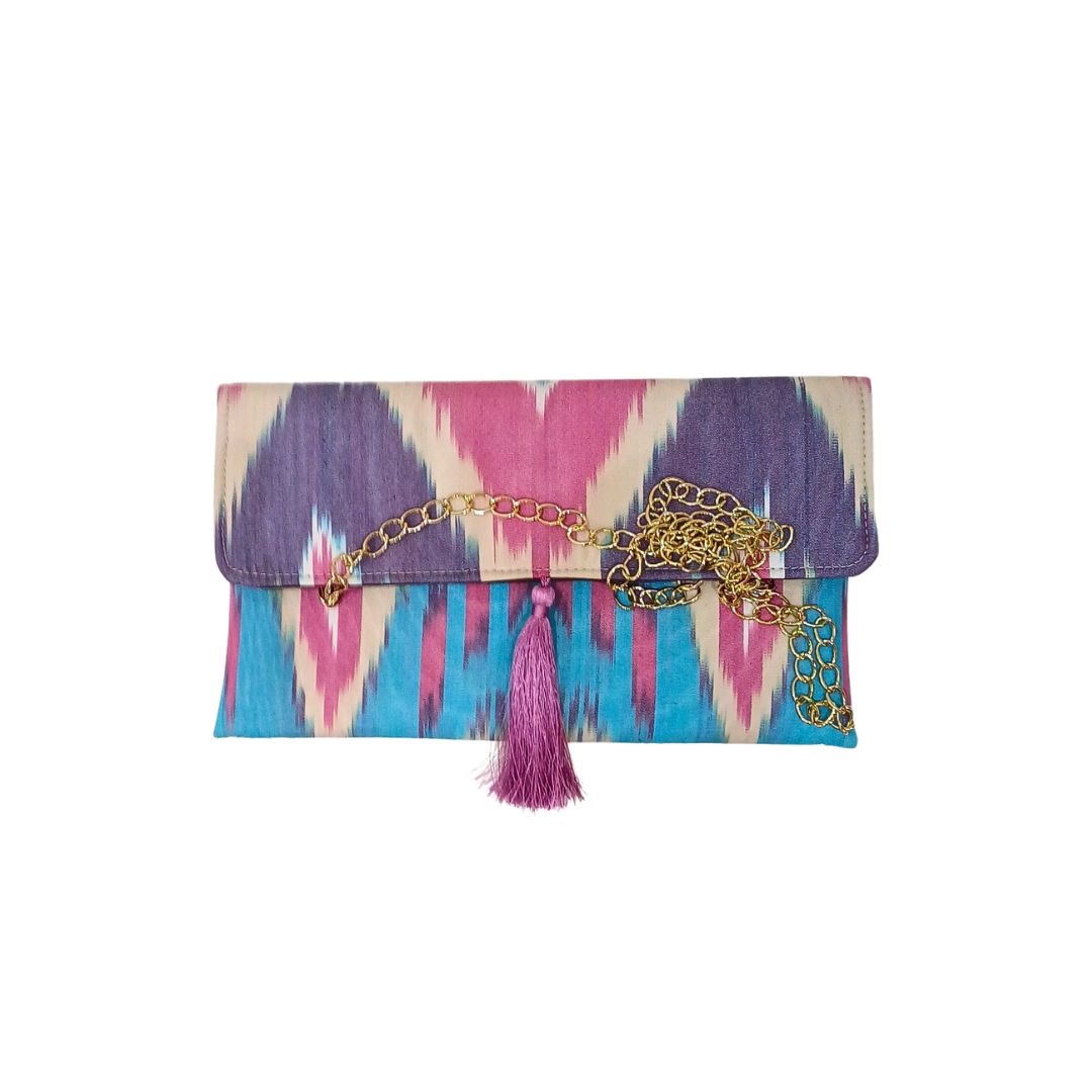 Clutch artesanal Ikat Roxa, azul e bege1