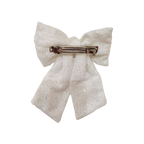 White sequin bow